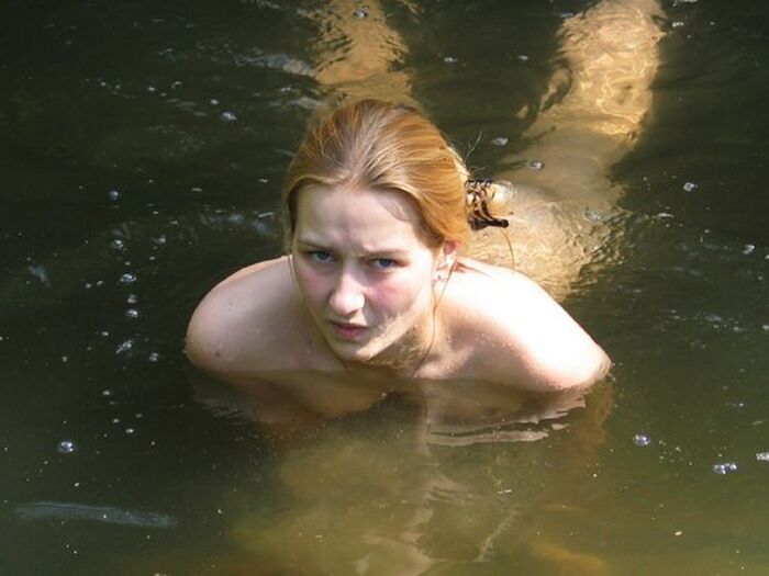 A blond girl from Russia is a nude swimmer in a dirty pond near a private lodge... Part1 18th image