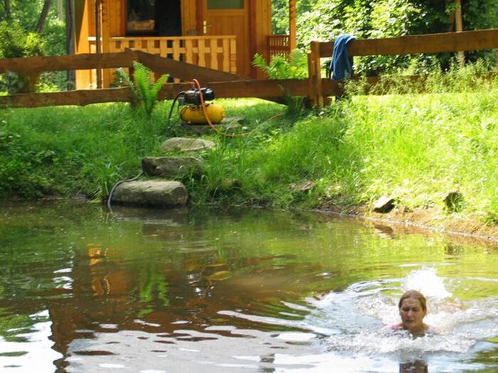 A blond girl from Russia is a nude swimmer in a dirty pond near a private lodge... Part1 7th image